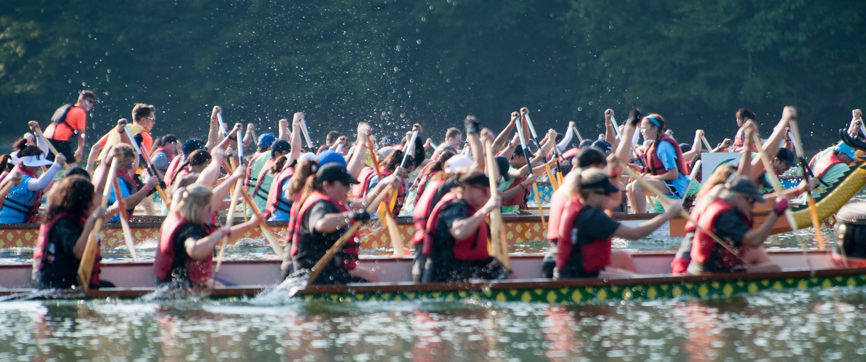 Dragon boat teams race across Lake Lanier at the Atlanta Hong Kong Dragon Boat Festival.