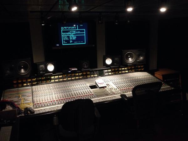 Context image: music recording studio mixing desk.