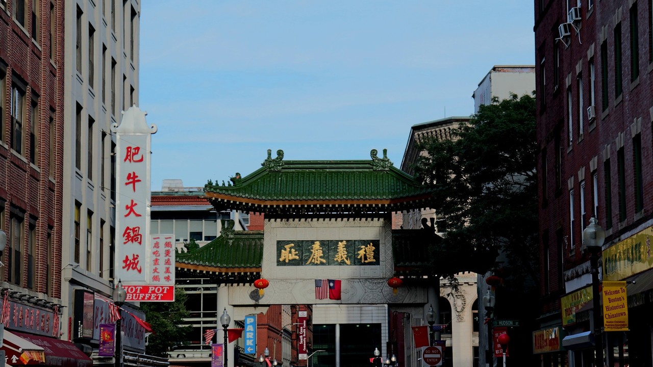 Boston Chinatown festival energy with community vendors and performances.