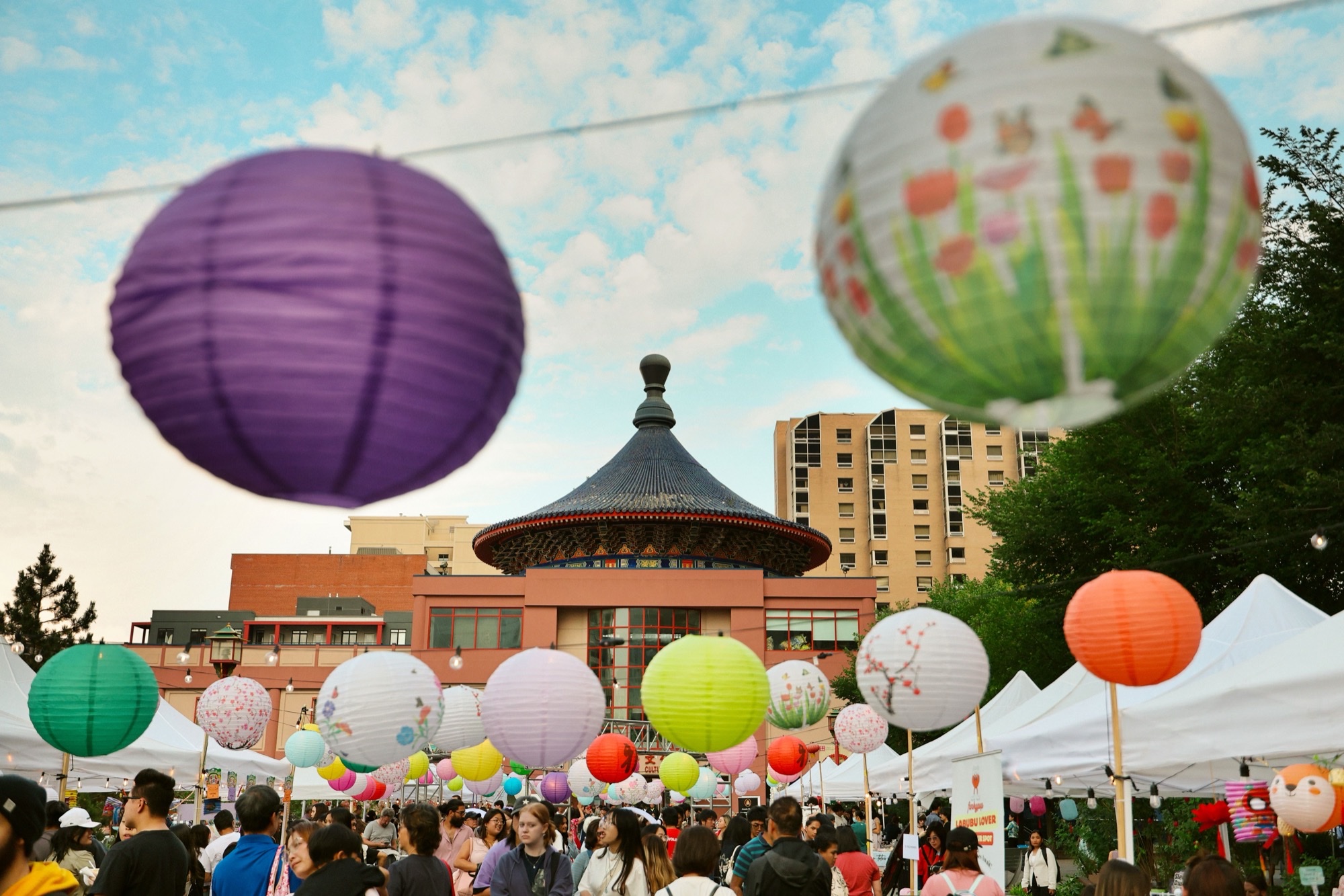 Lantern displays illuminating Calgary Chinatown for the Mid-Autumn Lantern Festival.