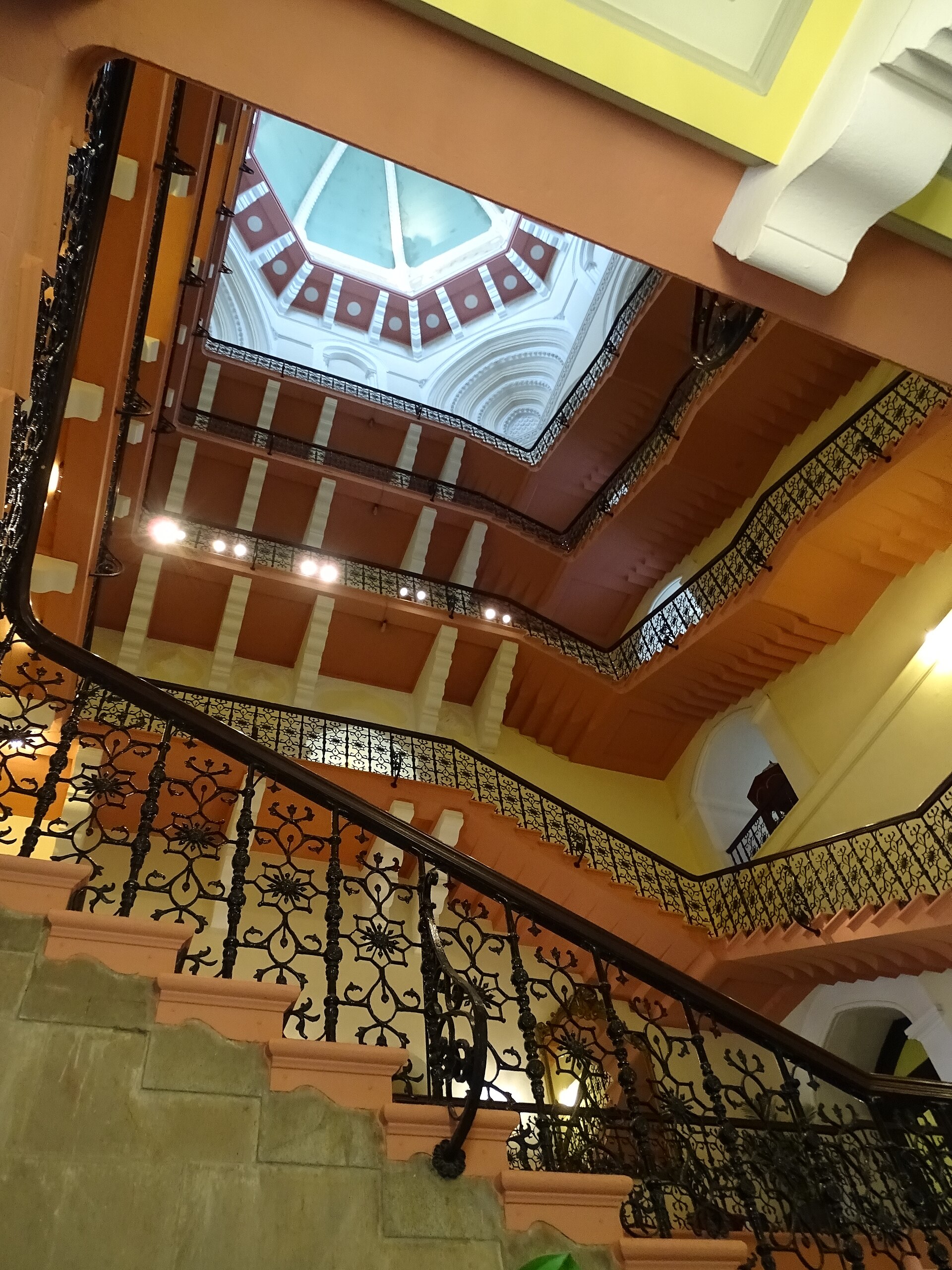 Grand staircase and atrium inside the Taj Mahal Palace Hotel, Mumbai