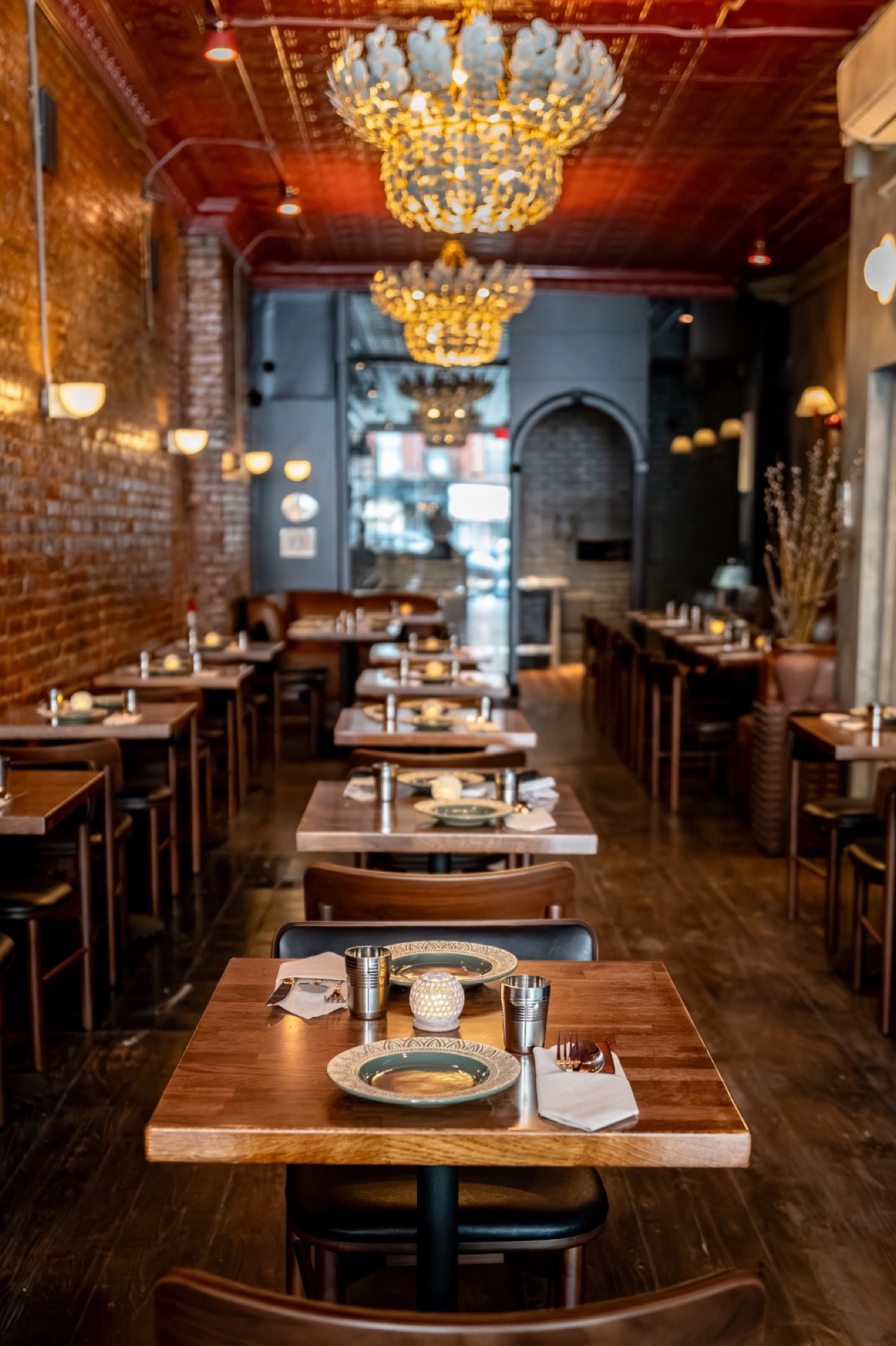 Dining room at Drāvida in the East Village, set for South Asian diaspora cooking.
