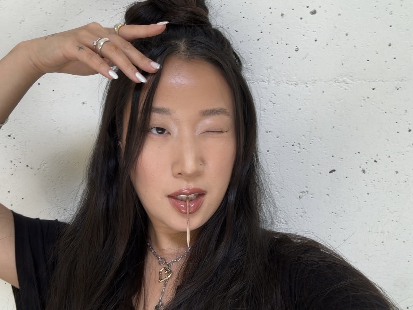 Portrait of creator Eunnuri Lee winking at the camera.