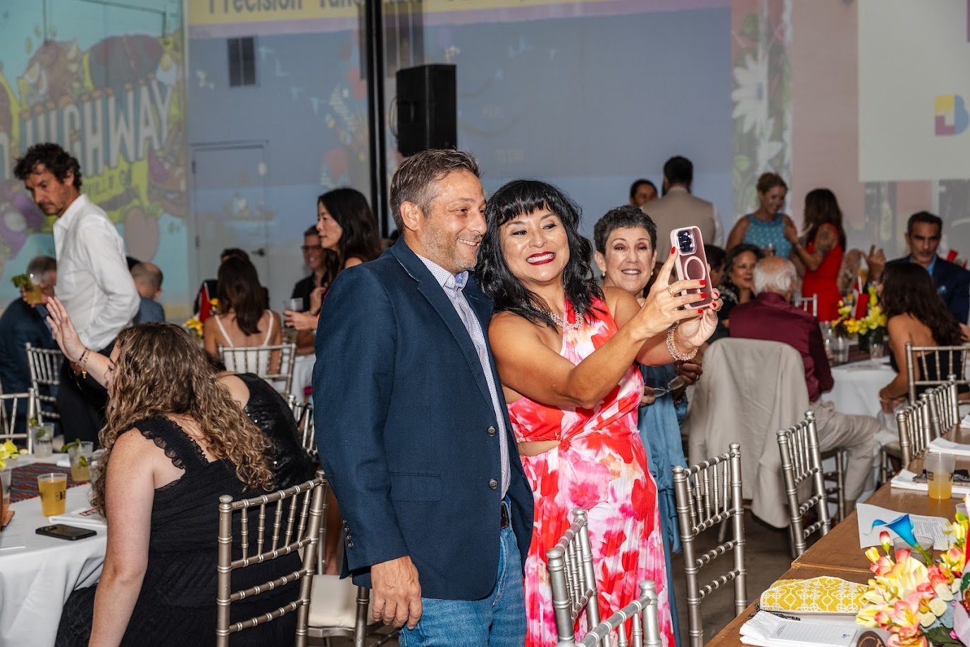 Guests mingle inside a previous We Love Buford Highway FEAST fundraiser.