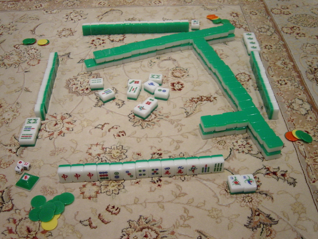 Context image: mahjong tiles on a table.