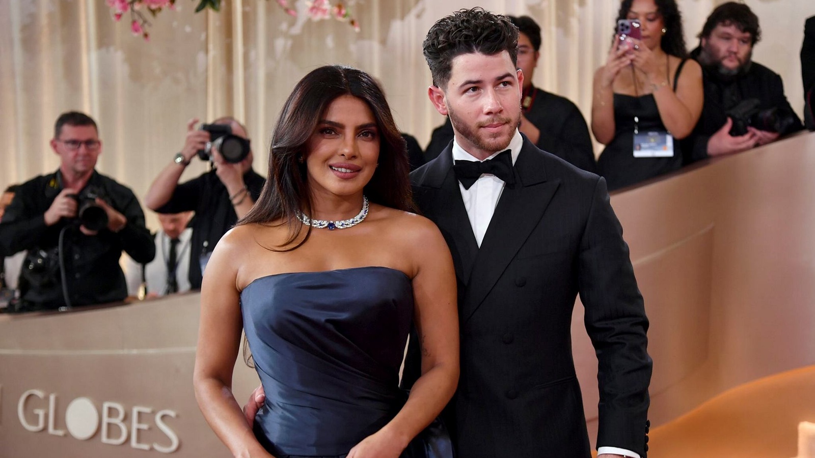 Priyanka Chopra Jonas and Nick Jonas on a Golden Globes red carpet.