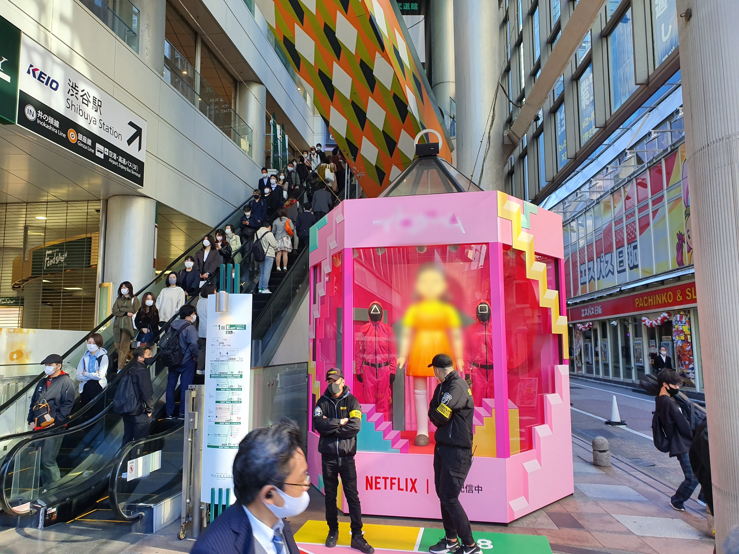 Squid Game promotional display in Shibuya for a Netflix title.