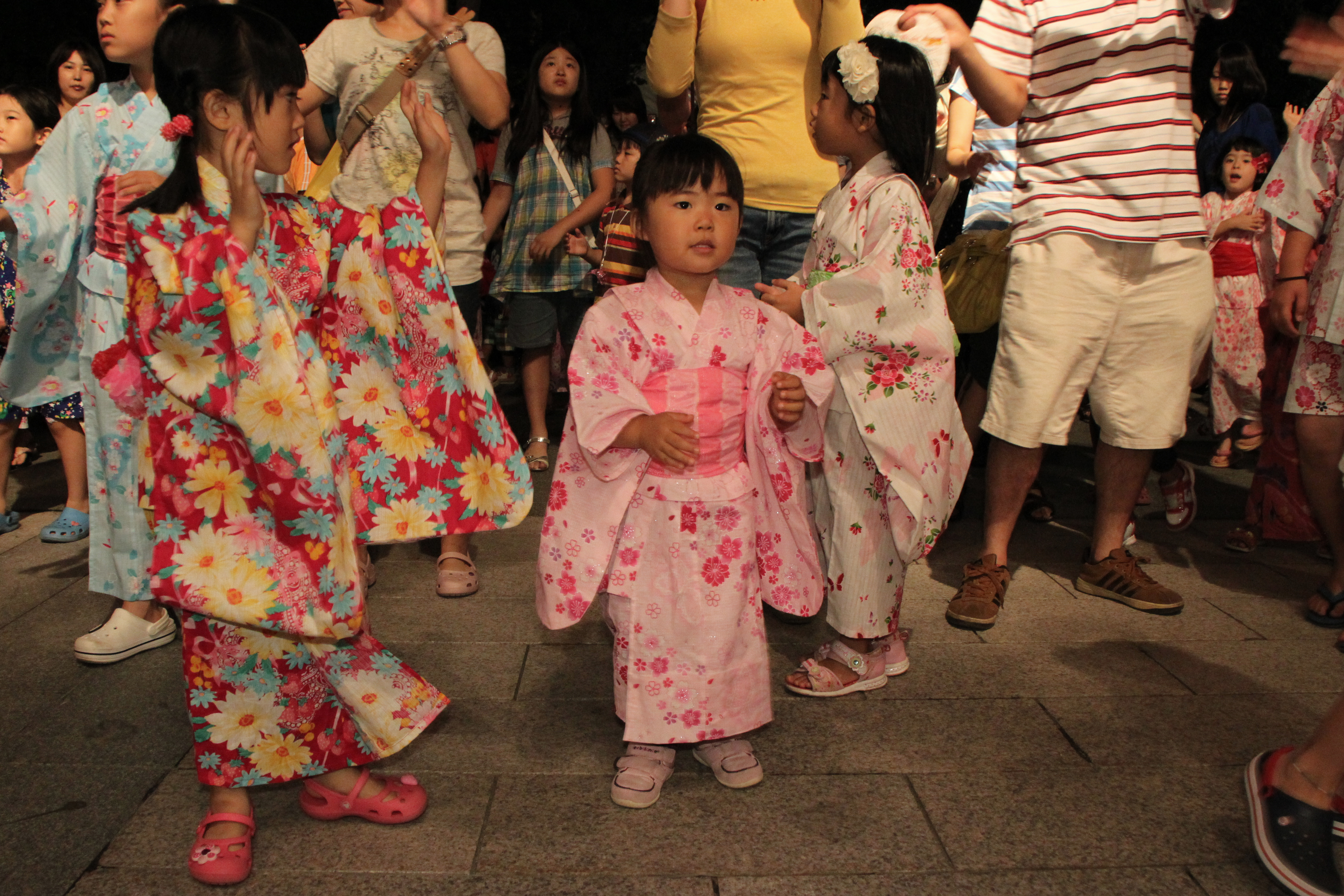 Bon Festival dancers in yukata at a summer Obon celebration.