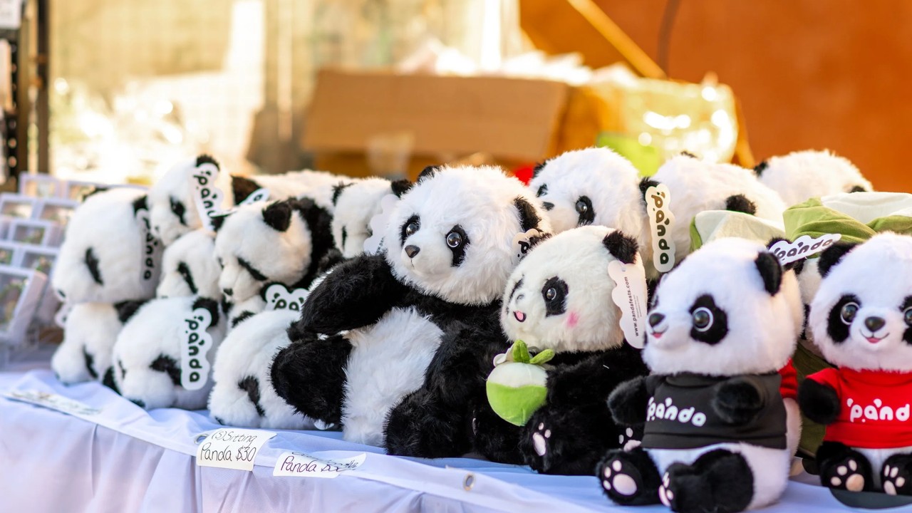 Panda Fest night market crowd and food vendors in Seattle.