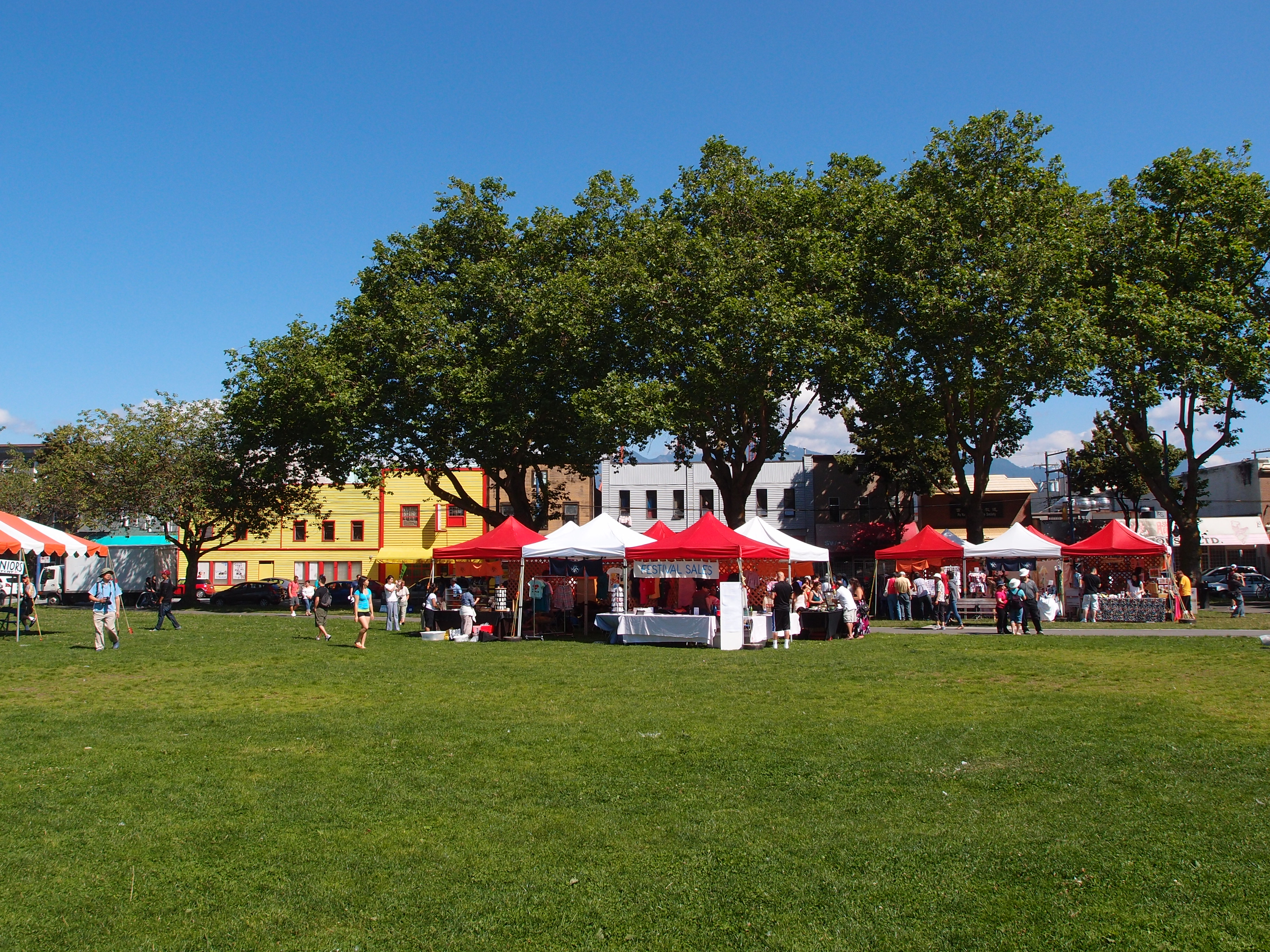Crowd and festival activity at Powell Street Festival in Oppenheimer Park, Vancouver.