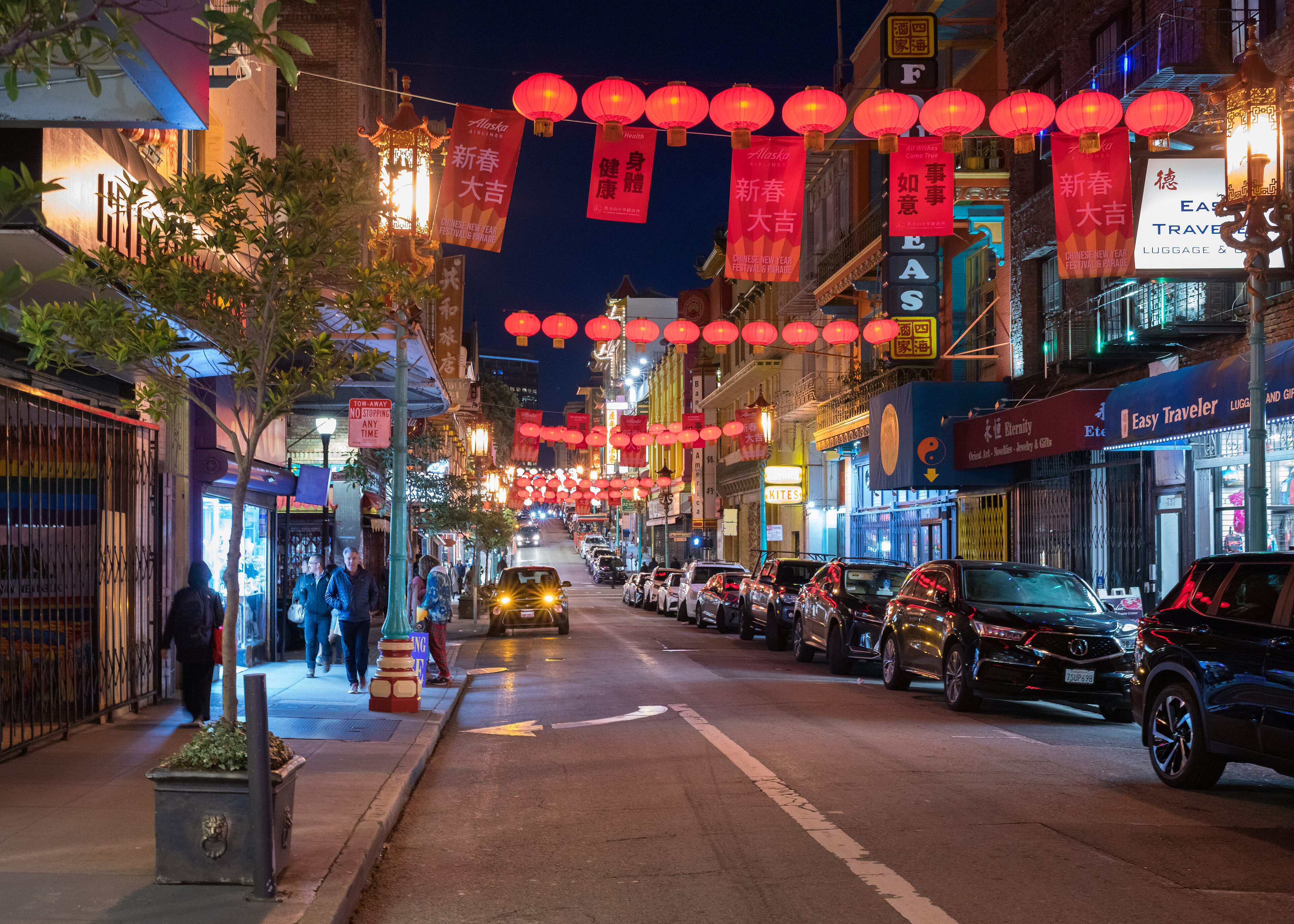 Grant Avenue in San Francisco Chinatown lit at night with neon signs.