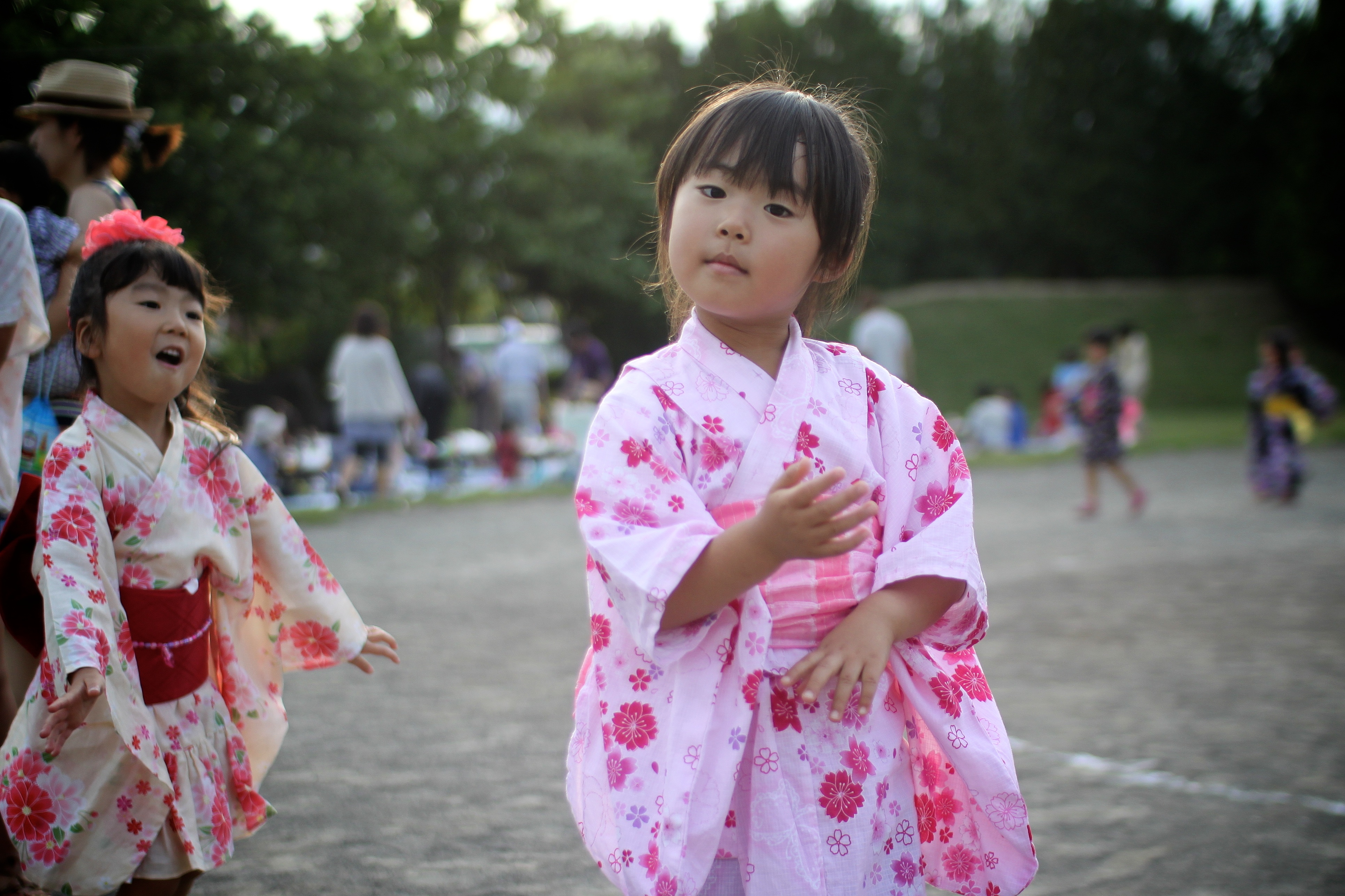 Bon Odori dancers in yukata at a summer temple festival.