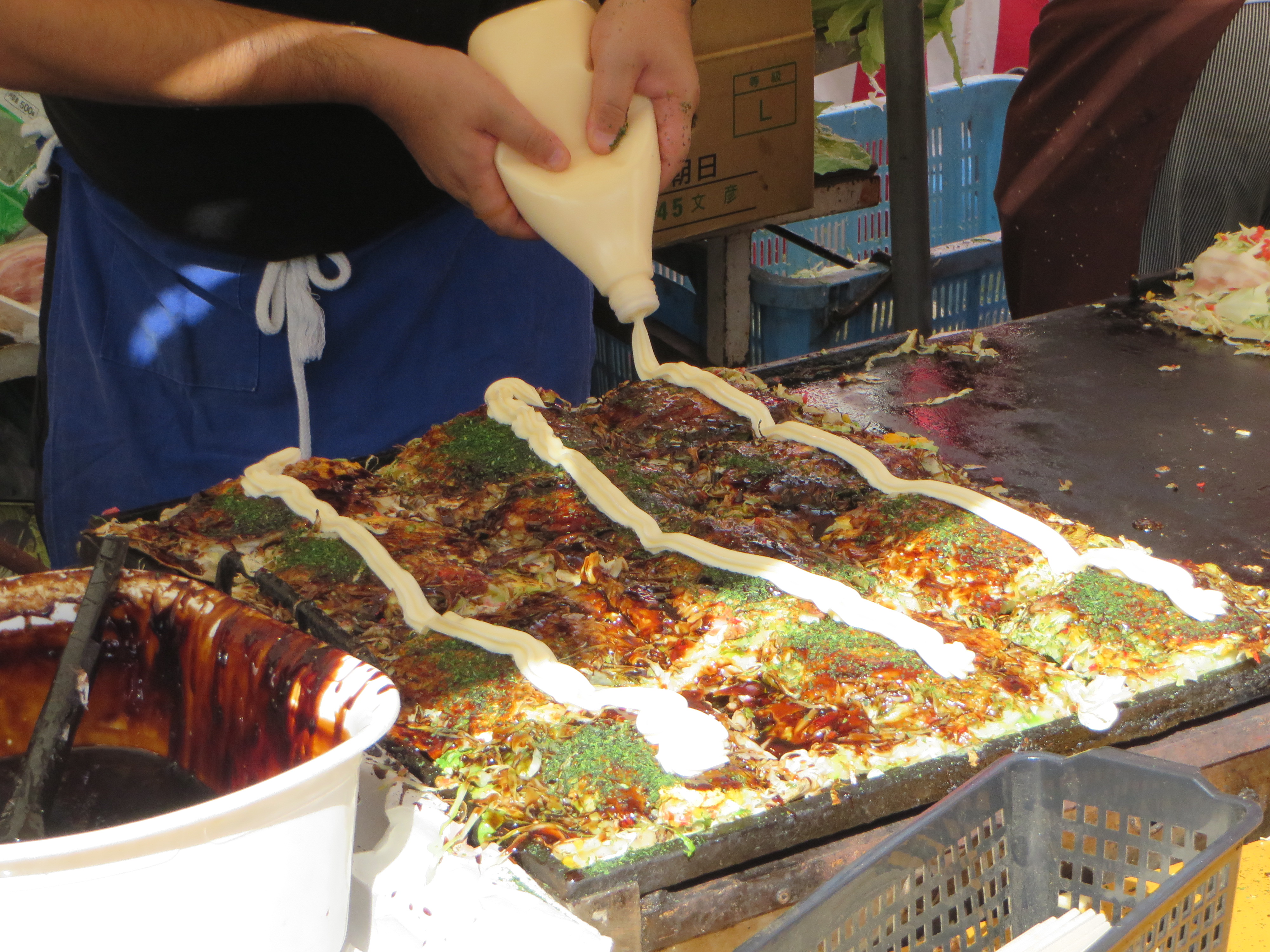 Context image: Japanese street food at a festival stall.
